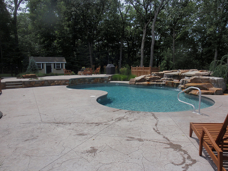 Swimming pool and stamped concrete project example 45